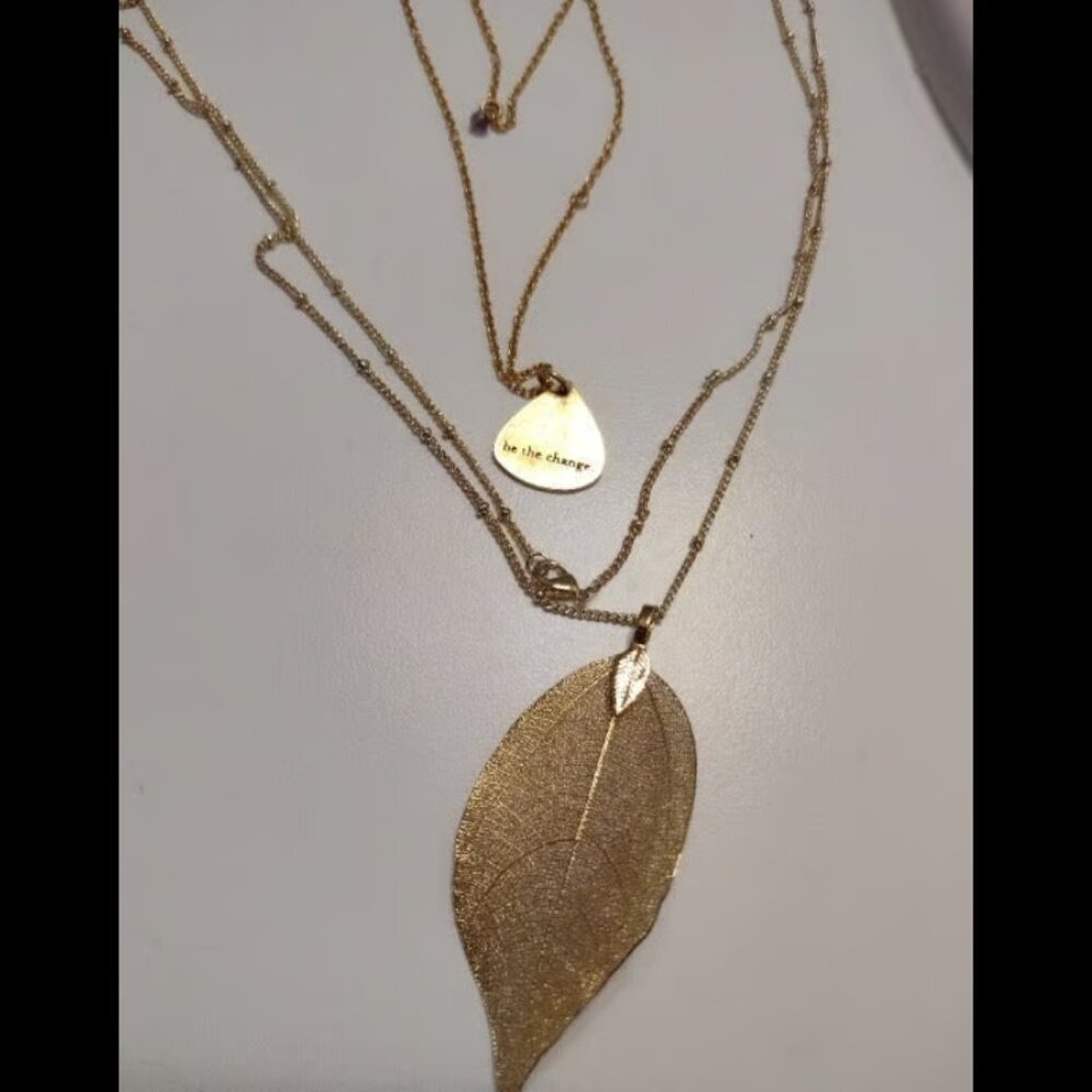 Pair of gold tone necklaces